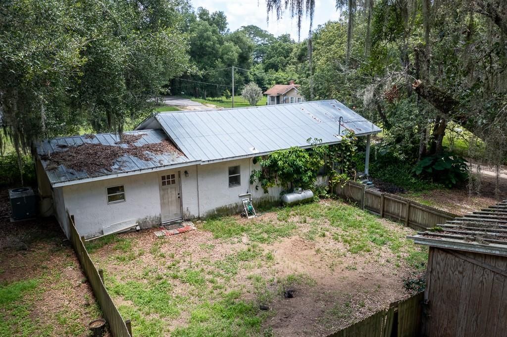 Fenced area by side of home