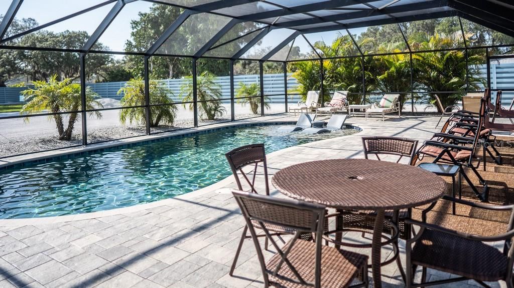Large saltwater pool in the center for all units to use in this fenced private property.