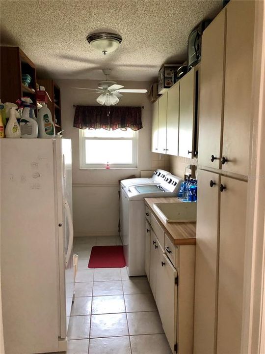 Laundry room with pantry