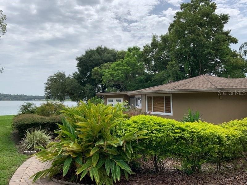 Charming front entrance with a view of the lake