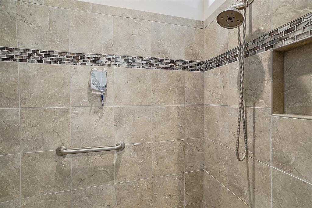 En suite with walk in tiled shower