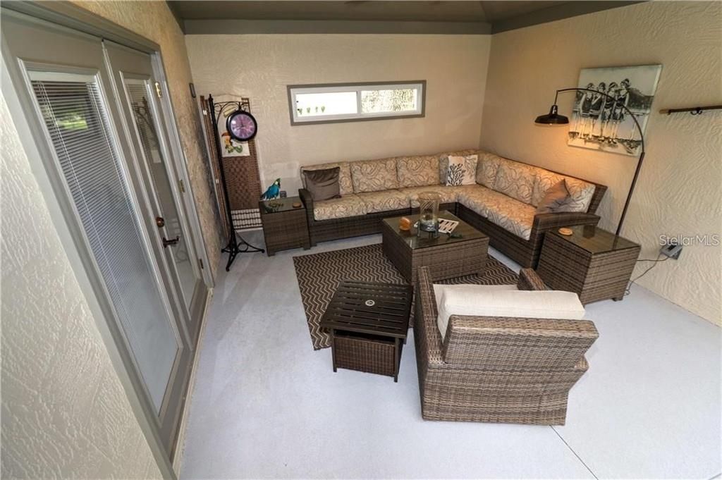 Covered lanai with access to dining area