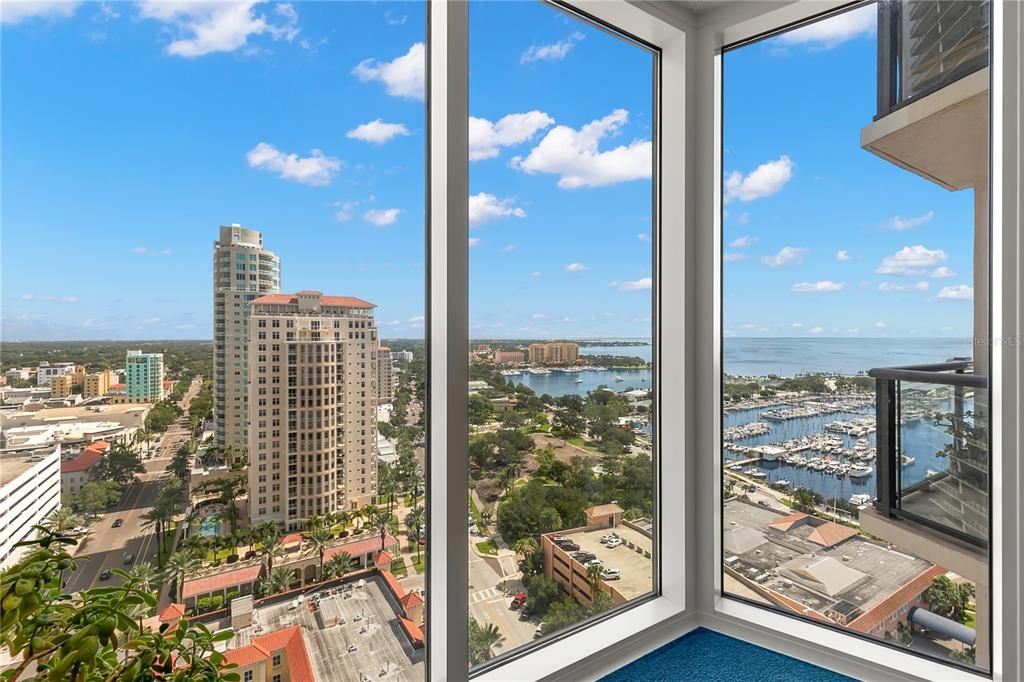 Panoramic floor to ceiling views from just about everywhere in this gorgeous 20th floor corner unit! (This view is taken from the 3rd bedroom/den)