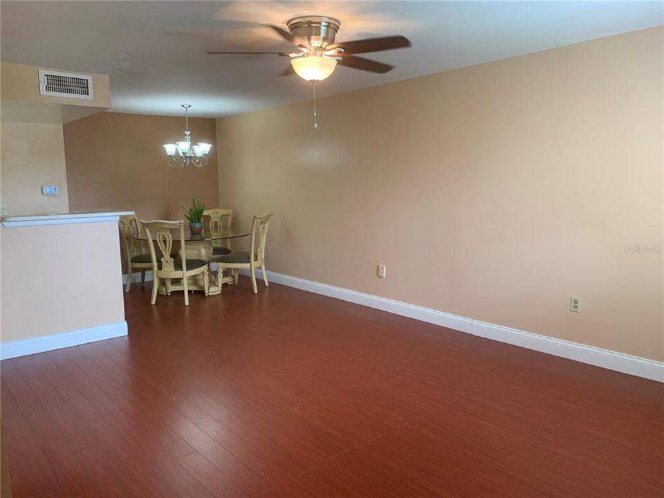 5 ft. round solid glass top table with etched wood base & 4 matching solid wood dining chairs included in this purchase!