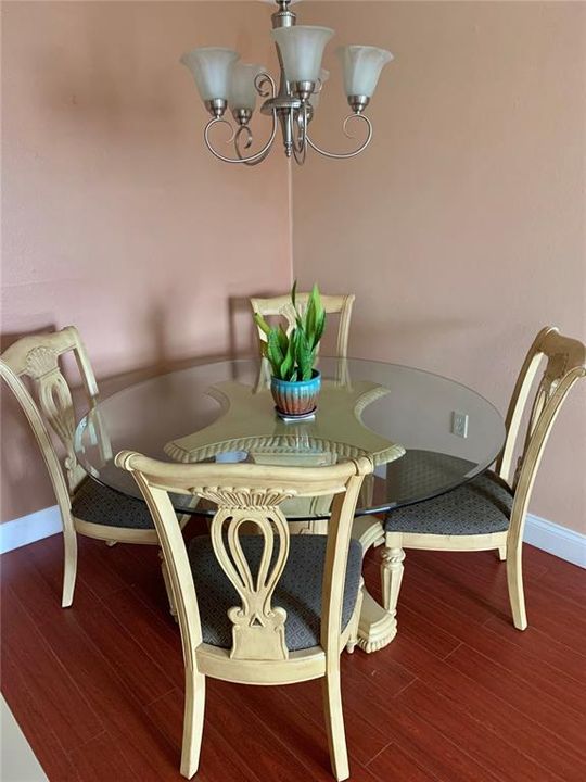 5 ft. round regal table & 4 matching solid wooden painted chairs here for you!