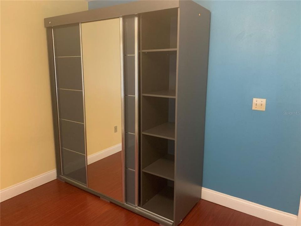 Custom Armoire Closet with right side open.