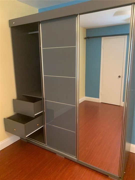 Custom Armoire Closet with left side open.