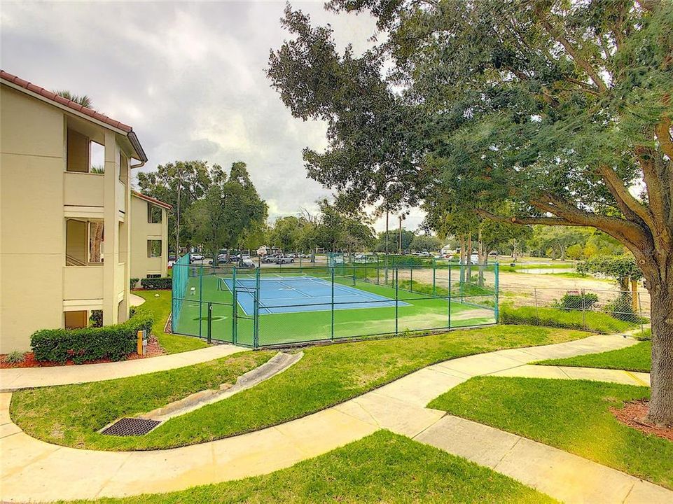 Sidewalk to your community tennis court & basketball court.