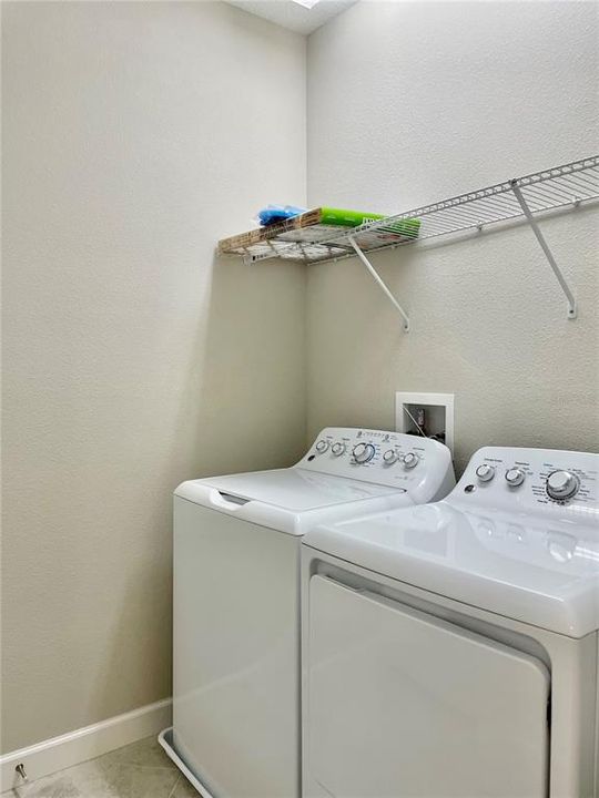 Room with full size washer & dryer