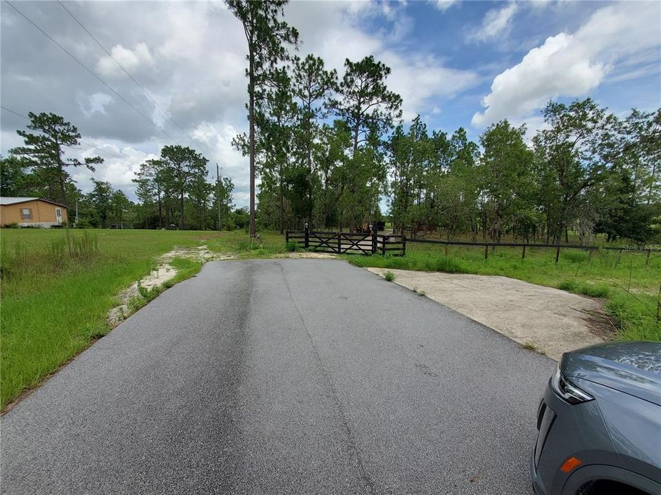 3 acres to the right at the end of Terrapin Dr.  gate and some fencing