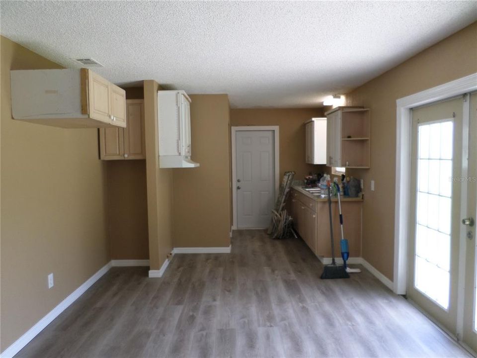 KITCHEN   REMODELING IS NOT FINISHED. FRENCH DOORS OUT TO BACKYARD