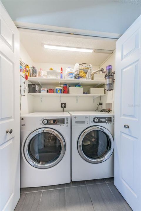 Laundry closet with full size washer / dryer on 2nd level