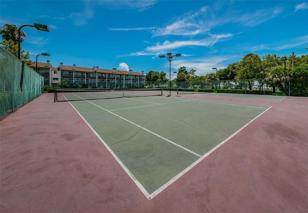 Tennis  courts on north end of property