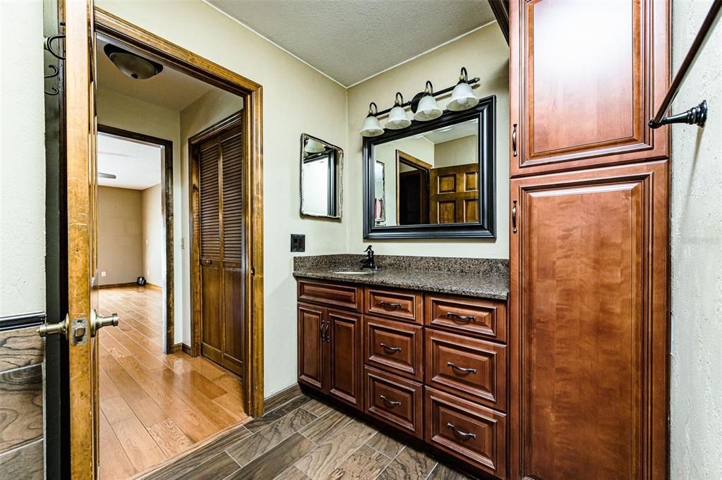 Lots of cabinets and built in linen closet