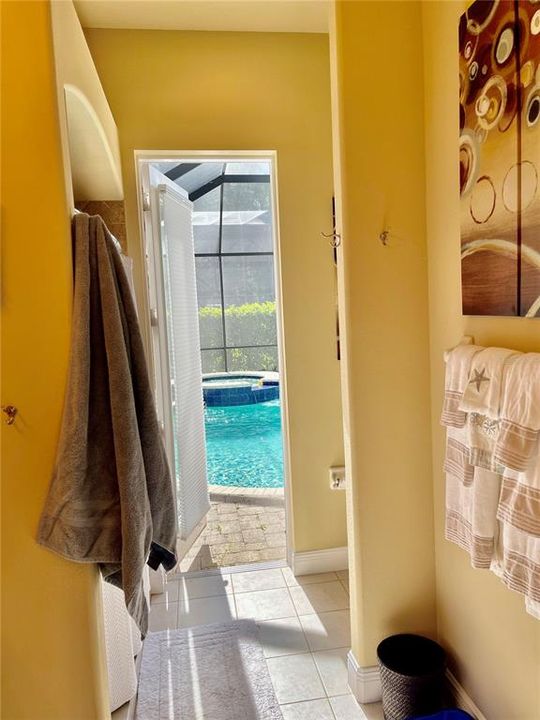 in-law suite leads to pool area via bathroom