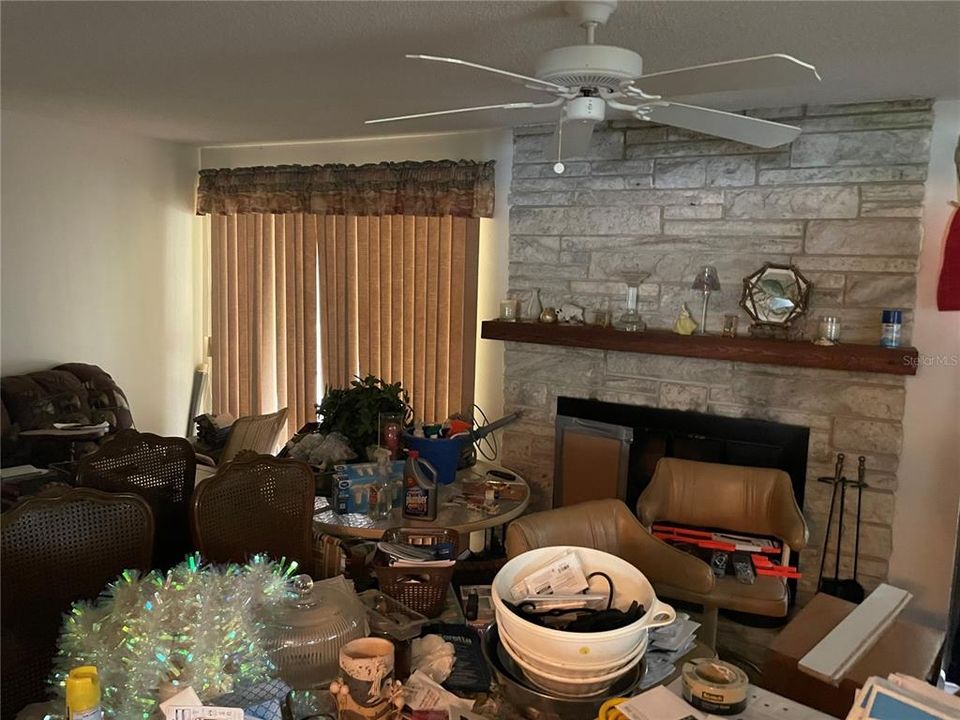 Family room with wood buring fireplace