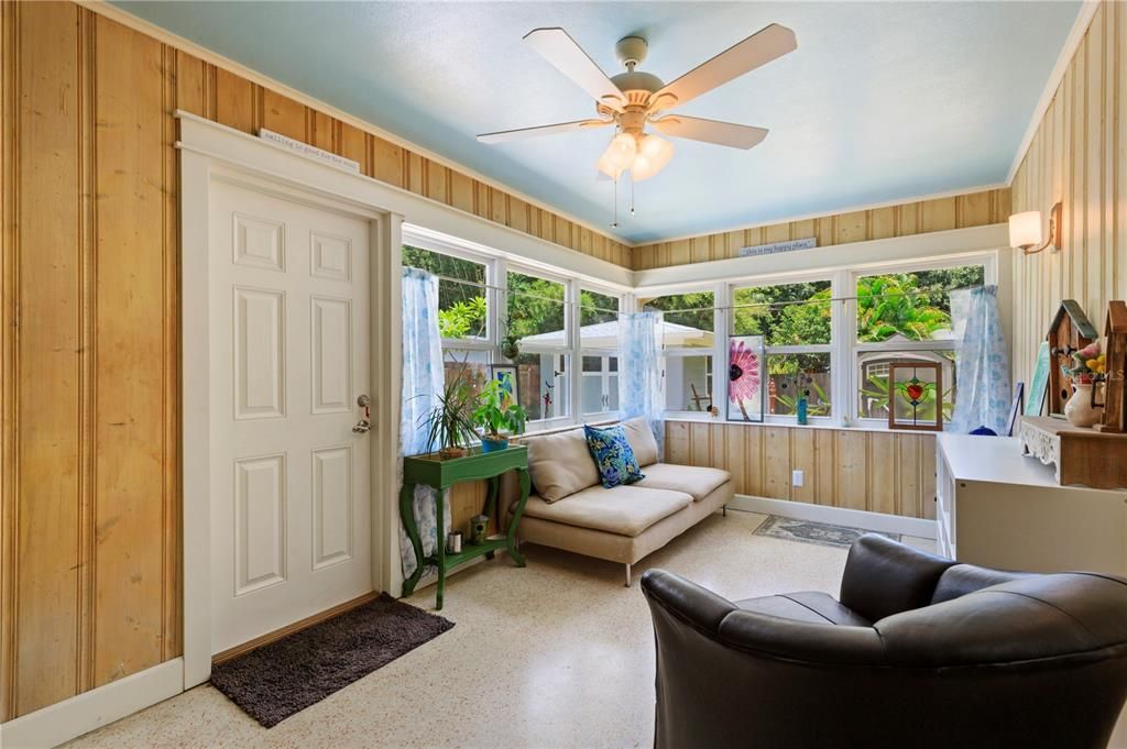 Lots of Light in the SunroomExterior Door to Backyard