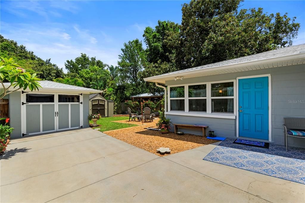 Detached Garage and Entry into the Sunroom in the House.