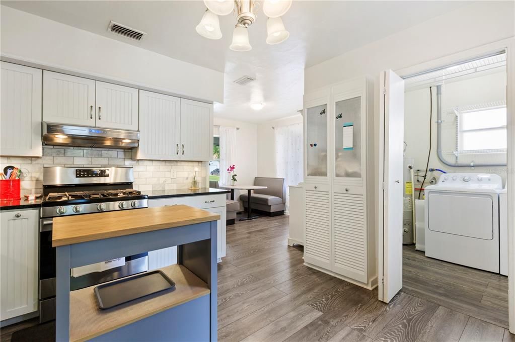 The large laundry room is located off the Kitchen