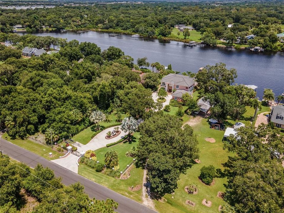 GATED 1 ACRE WATERFRONT ESTATE!