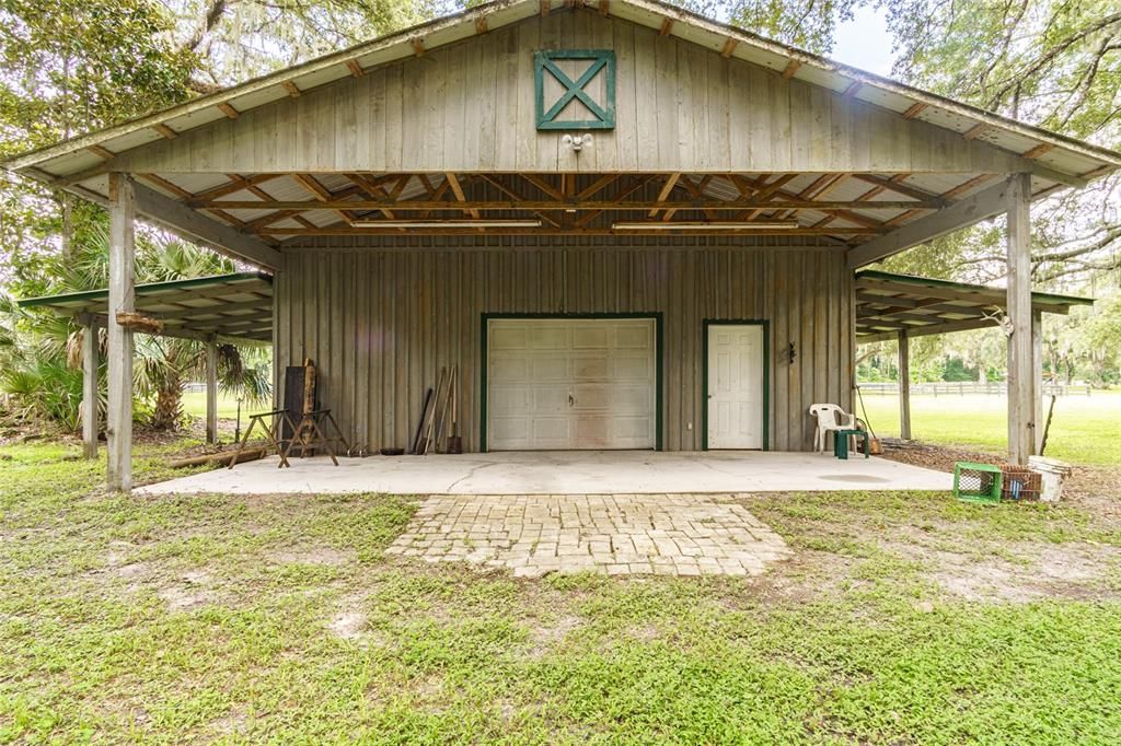 Back area of barn with large concrete pad
