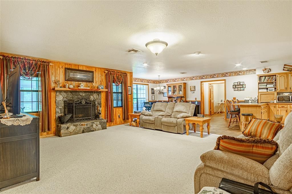 Living room with beautiful stone fireplace