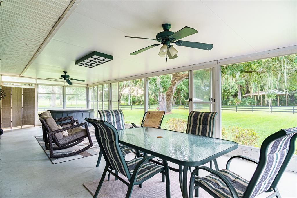 Huge Back porch...with large windows to view all the abundance of nature in the area.