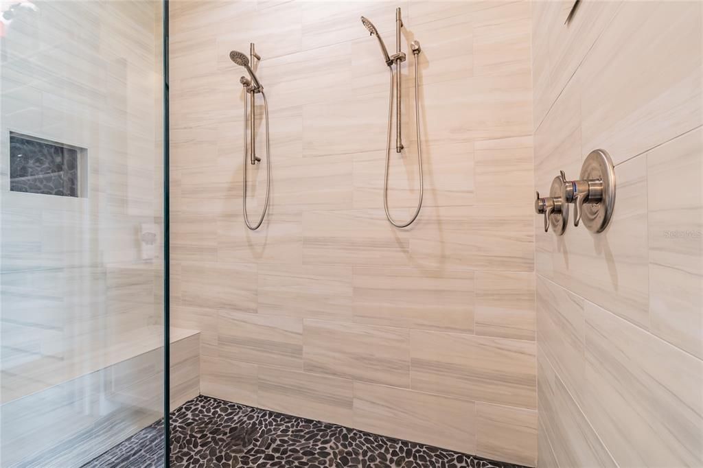Master shower with double shower heads.