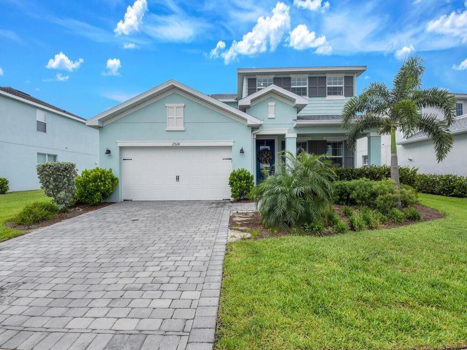 Front Elevation w/ paver driveway