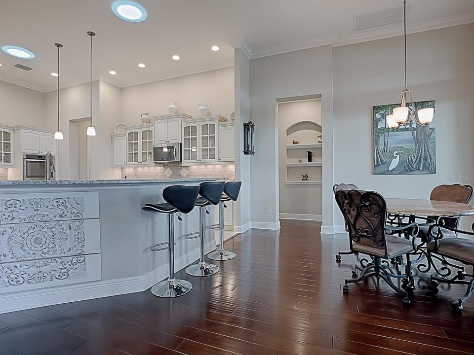 THIS DOORWAY LEADS TO THE LAUNDRY ROOM TO THE LEFT AND THE MASTER BEDROOM TO THE RIGHT!