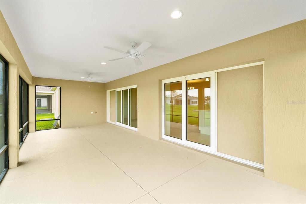 Huge screened covered lanai facing the POND!