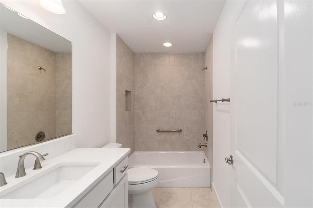 Rear Guest Bathroom with tub and shower combo