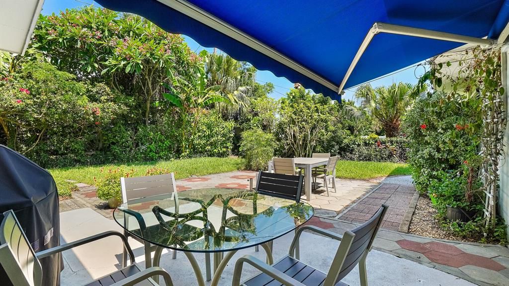 spacious Backyard Patio w/remote Awning...plenty of room for a POOL !!