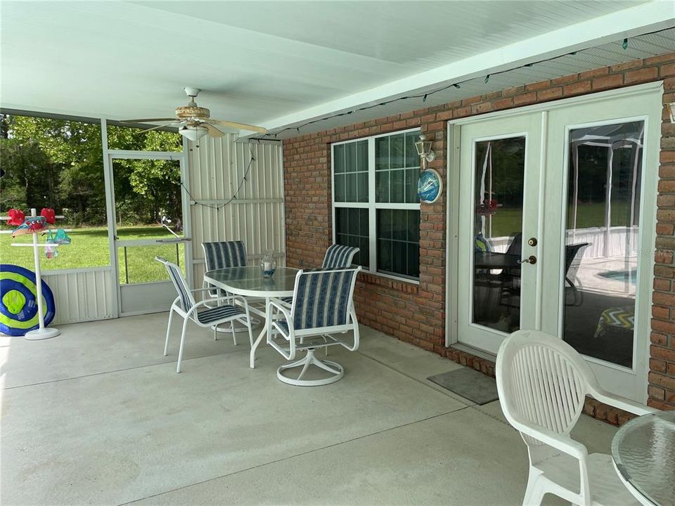 COVERED AREA BETWEEN POOL AND HOME