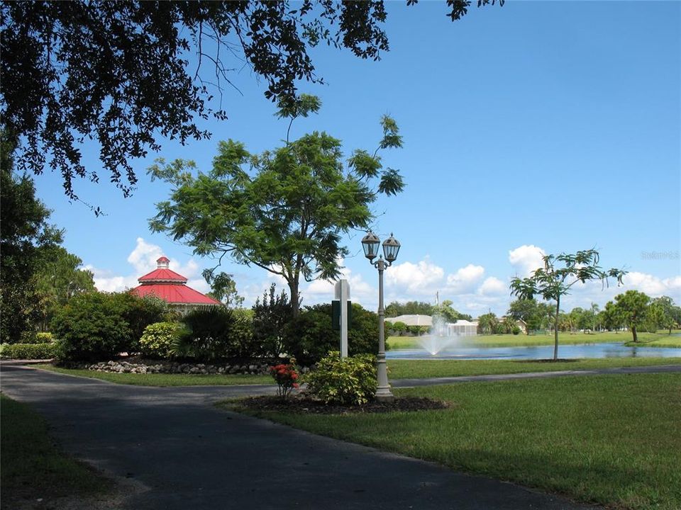 walking path, pond and gazebo