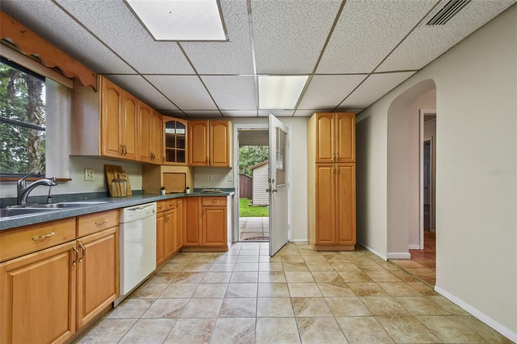 Gardener? Here is your direct access to the rear yard where you have the space to grow your own. To the right through the archway you have are in the laundry room and can grab your supplies from the huge storage pantry able to handle the largest Costco trip!