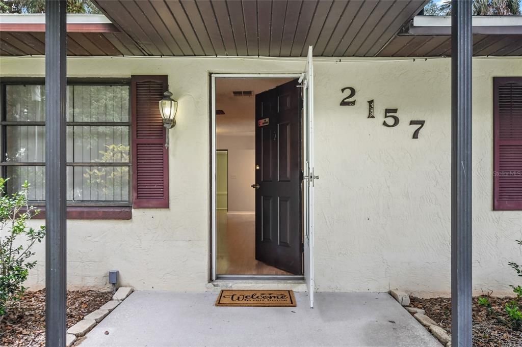 Welcome home!  Lovely covered porch entry leads into oversized great room ready to receive your family and guests.