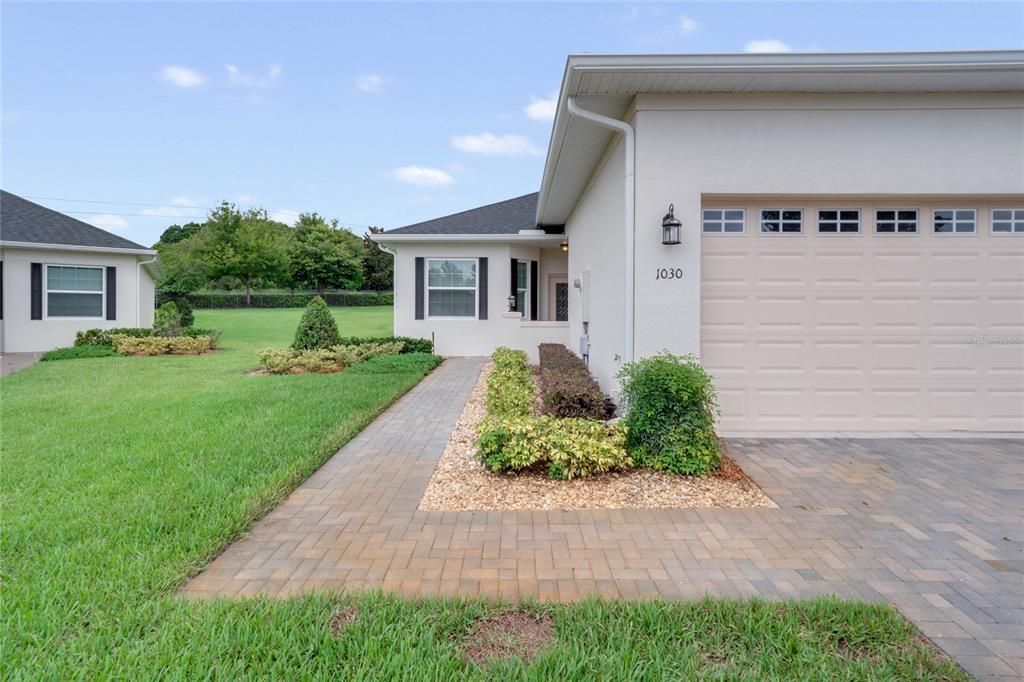 Front entry with beautifully maintained curb appeal!