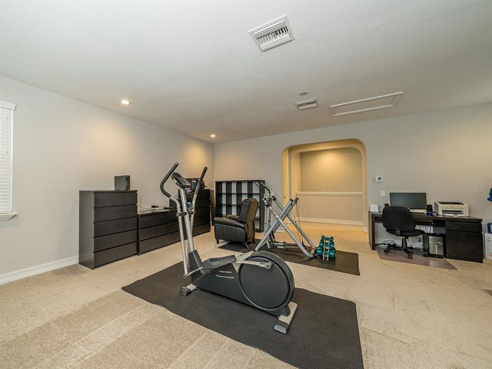 BONUS room with water views is great for FITNESS, OFFICE space or MANCAVE!