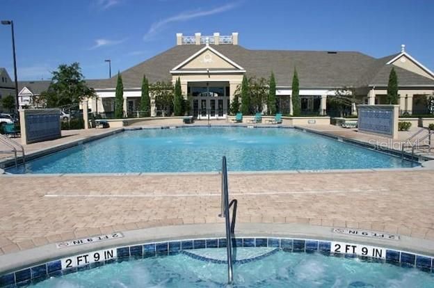 Main heated pool, jacuzzi, & clubhouse
