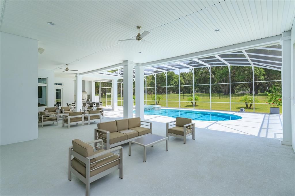 Large covered deck with plenty of seating and great for entertaining.