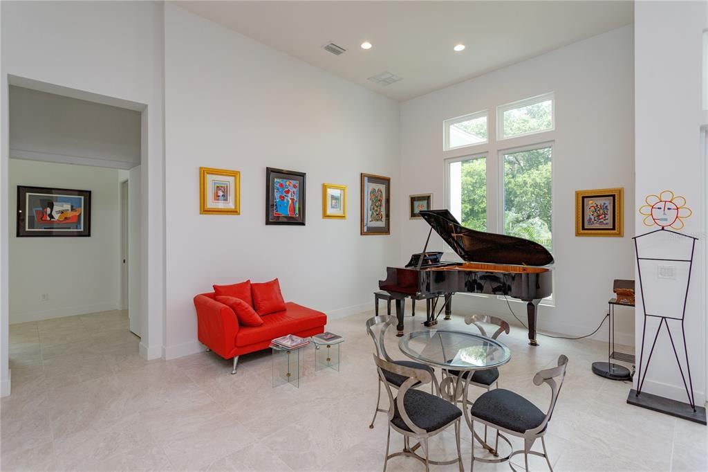Formal living with baby grand piano