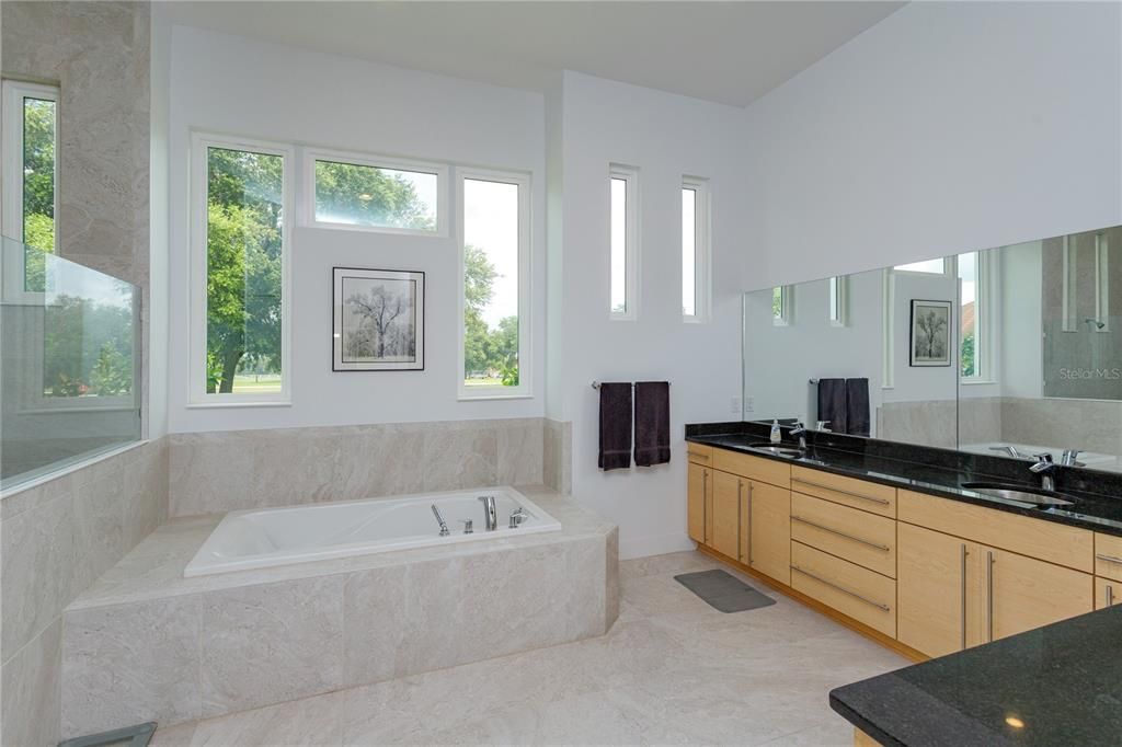 Master bathroom dual sinks and even a make up desk