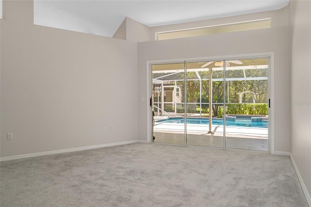 Living Room opening to Lanai and pool