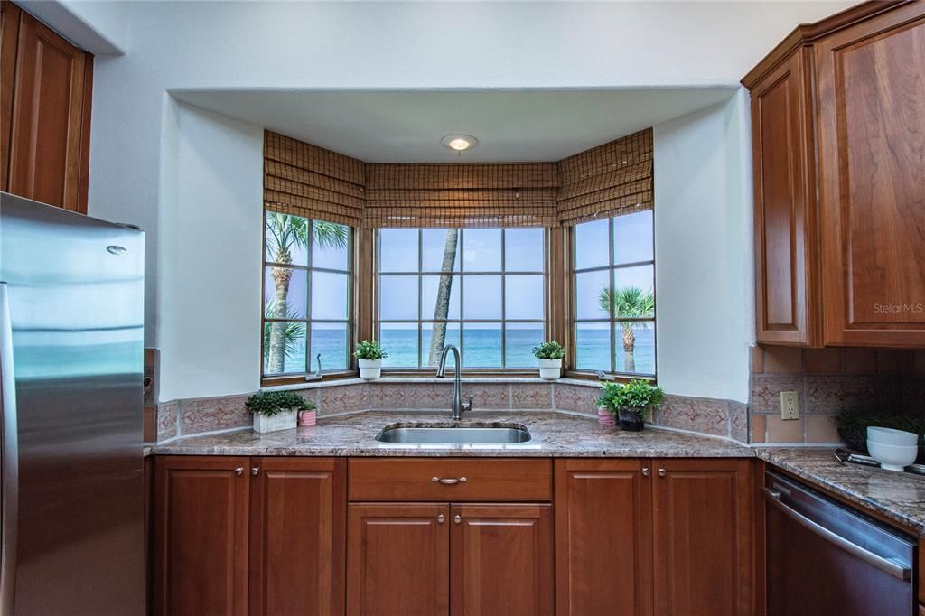 Captivating water views from a well positioned bay window over the kitchen sink will inspire any chef!