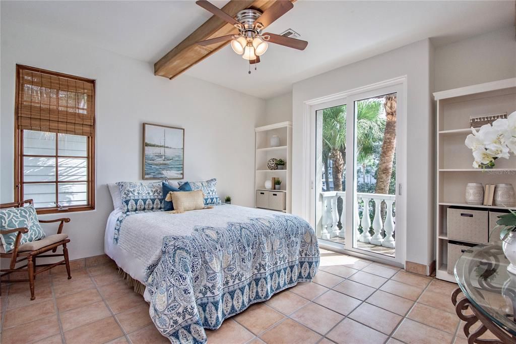 4th guest bedroom with Juliette Balcony offers great flex space to use as you prefer- maybe a motivating office .... its located on the 2nd floor/main living level and shares a Jack-and-Jill bathroom.