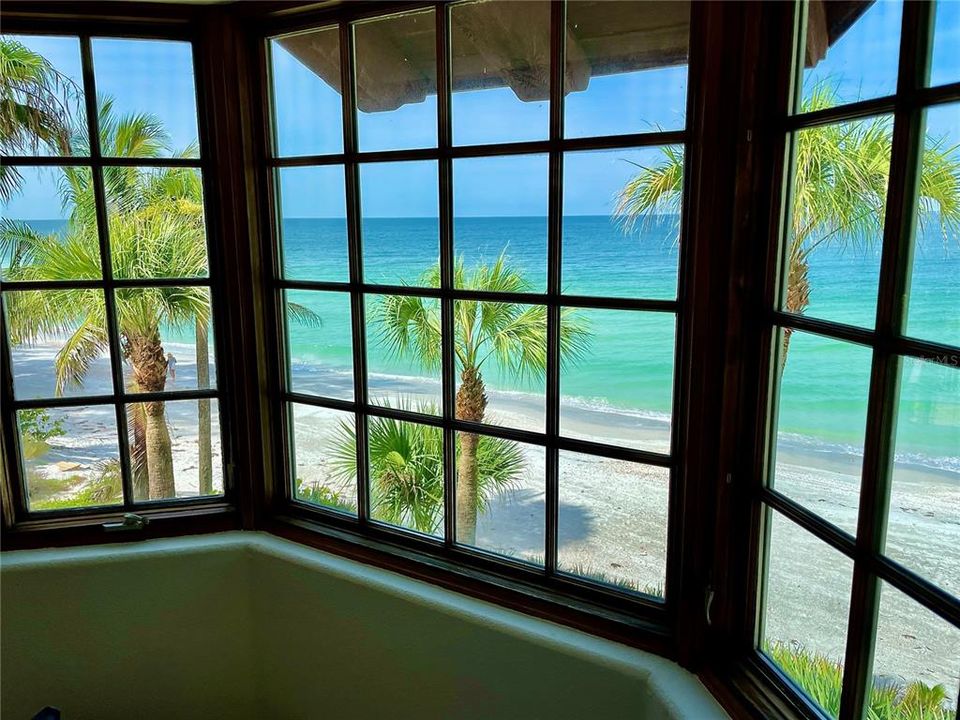Captivating water views from well positioned bay windows in the Owners Suite and Kitchen.