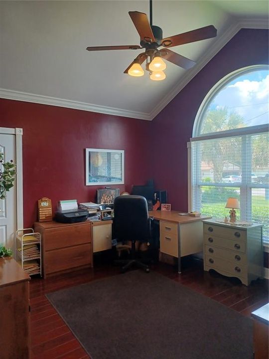 The Red Room -Currently used as a home office, this room has a closet and can easily be used as a 3rd bedroom or craft room.