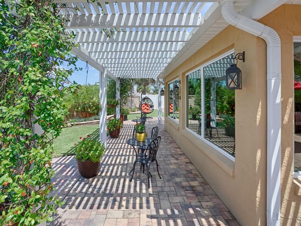 SIDE YARD WITH PERGOLA AND ANOTHER GREAT SPOT TO RELAX!  IT JUST KEEPS ON GOING!