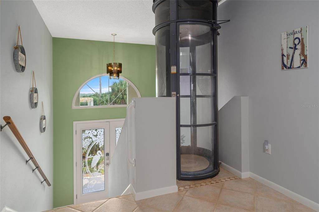 Foyer with Elevator to Lower Level